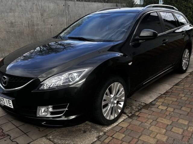 Черный Мазда 6, объемом двигателя 2 л и пробегом 230 тыс. км за 7499 $, фото 1 на Automoto.ua