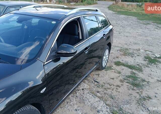 Чорний Мазда 6, об'ємом двигуна 2 л та пробігом 247 тис. км за 7501 $, фото 3 на Automoto.ua
