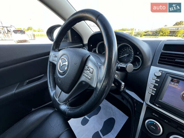 Чорний Мазда 6, об'ємом двигуна 1.8 л та пробігом 220 тис. км за 9300 $, фото 32 на Automoto.ua