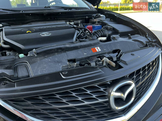 Чорний Мазда 6, об'ємом двигуна 1.8 л та пробігом 220 тис. км за 9300 $, фото 63 на Automoto.ua