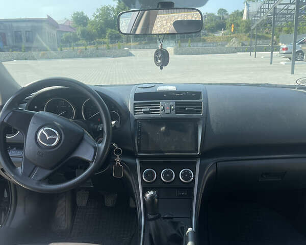 Черный Мазда 6, объемом двигателя 2.2 л и пробегом 276 тыс. км за 7500 $, фото 10 на Automoto.ua