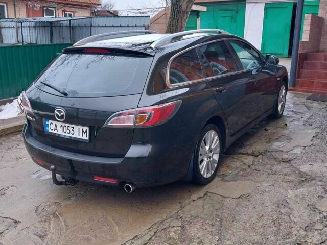 Черный Мазда 6, объемом двигателя 1.8 л и пробегом 300 тыс. км за 6000 $, фото 3 на Automoto.ua