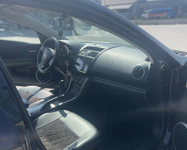 Черный Мазда 6, объемом двигателя 2.2 л и пробегом 276 тыс. км за 7500 $, фото 9 на Automoto.ua