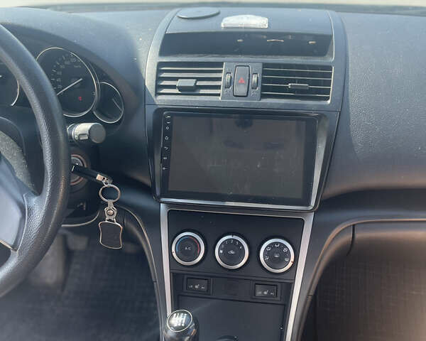 Черный Мазда 6, объемом двигателя 2.2 л и пробегом 276 тыс. км за 7500 $, фото 11 на Automoto.ua