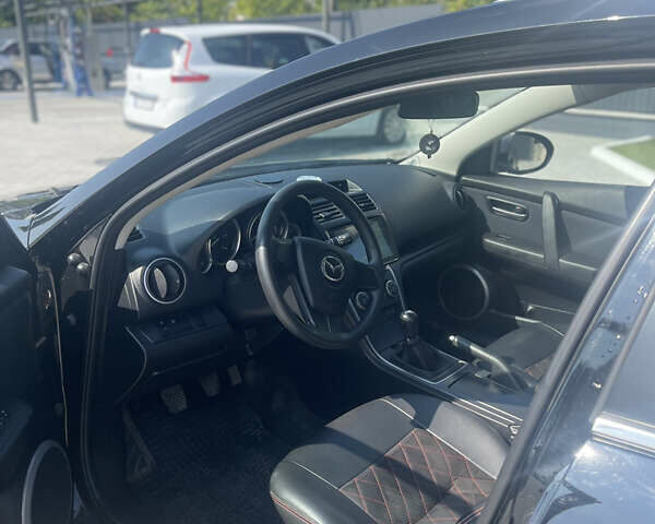 Черный Мазда 6, объемом двигателя 2.2 л и пробегом 276 тыс. км за 7500 $, фото 5 на Automoto.ua