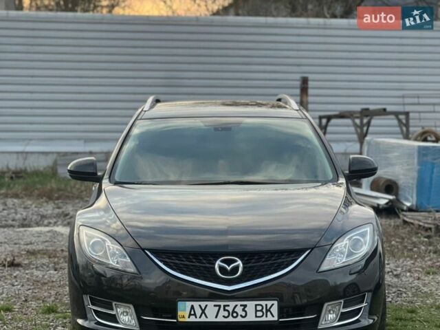 Черный Мазда 6, объемом двигателя 2 л и пробегом 130 тыс. км за 6800 $, фото 1 на Automoto.ua