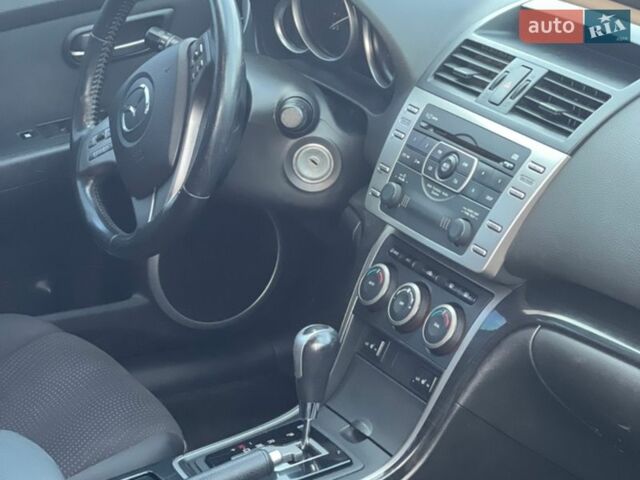 Черный Мазда 6, объемом двигателя 2 л и пробегом 130 тыс. км за 6800 $, фото 2 на Automoto.ua