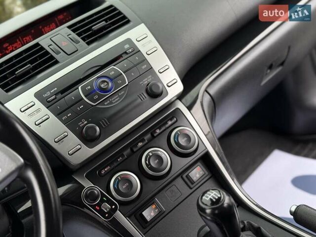 Черный Мазда 6, объемом двигателя 2.2 л и пробегом 250 тыс. км за 6150 $, фото 57 на Automoto.ua