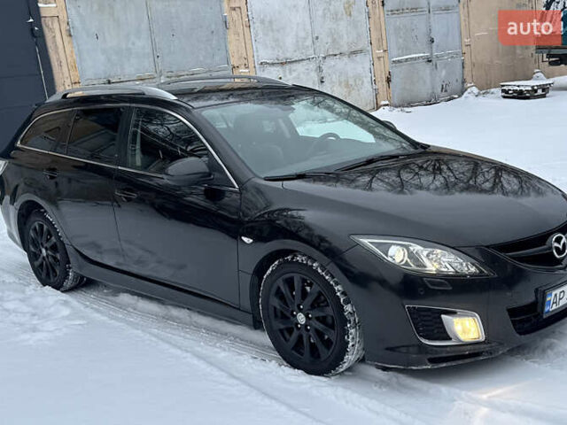 Черный Мазда 6, объемом двигателя 2.15 л и пробегом 225 тыс. км за 6300 $, фото 1 на Automoto.ua