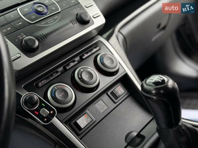 Черный Мазда 6, объемом двигателя 2.2 л и пробегом 250 тыс. км за 6150 $, фото 58 на Automoto.ua