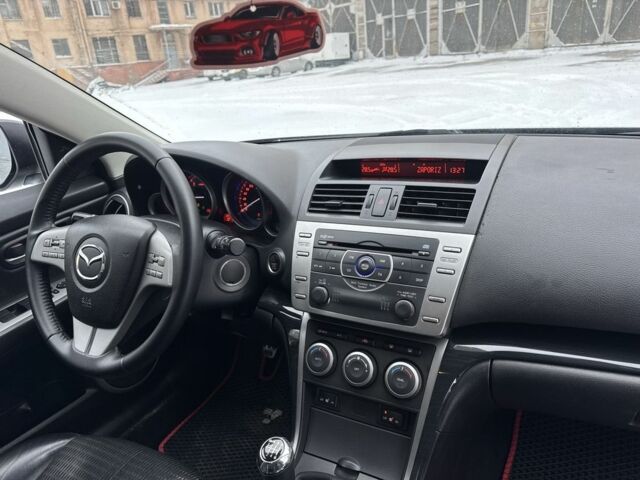 Черный Мазда 6, объемом двигателя 2.1 л и пробегом 225 тыс. км за 6300 $, фото 8 на Automoto.ua