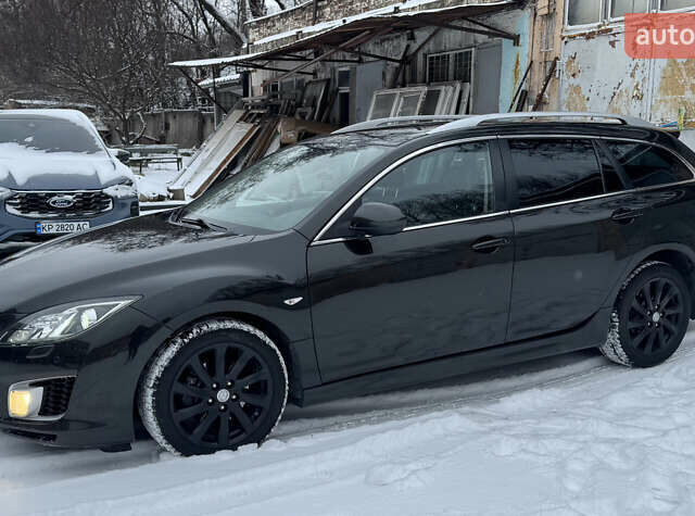 Черный Мазда 6, объемом двигателя 2.15 л и пробегом 225 тыс. км за 6300 $, фото 2 на Automoto.ua