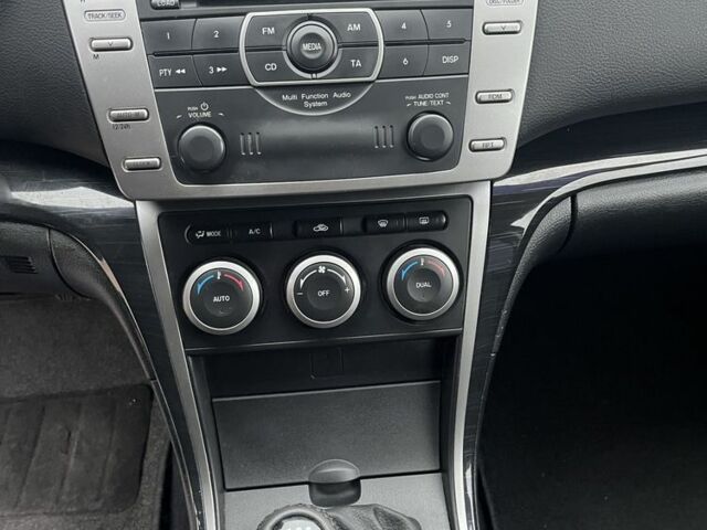 Черный Мазда 6, объемом двигателя 2 л и пробегом 180 тыс. км за 7600 $, фото 9 на Automoto.ua