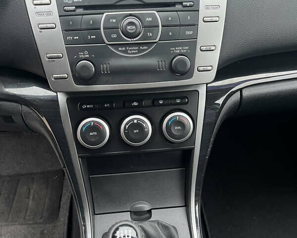 Черный Мазда 6, объемом двигателя 2 л и пробегом 180 тыс. км за 7600 $, фото 9 на Automoto.ua