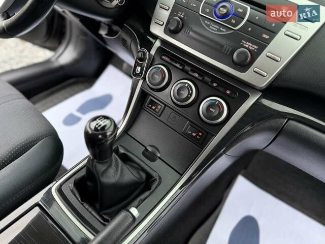 Черный Мазда 6, объемом двигателя 2.2 л и пробегом 250 тыс. км за 6150 $, фото 75 на Automoto.ua