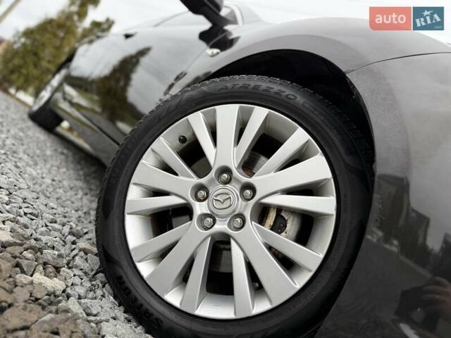 Черный Мазда 6, объемом двигателя 2.2 л и пробегом 250 тыс. км за 6150 $, фото 10 на Automoto.ua