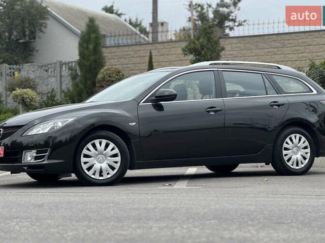 Чорний Мазда 6, об'ємом двигуна 2 л та пробігом 249 тис. км за 6999 $, фото 5 на Automoto.ua