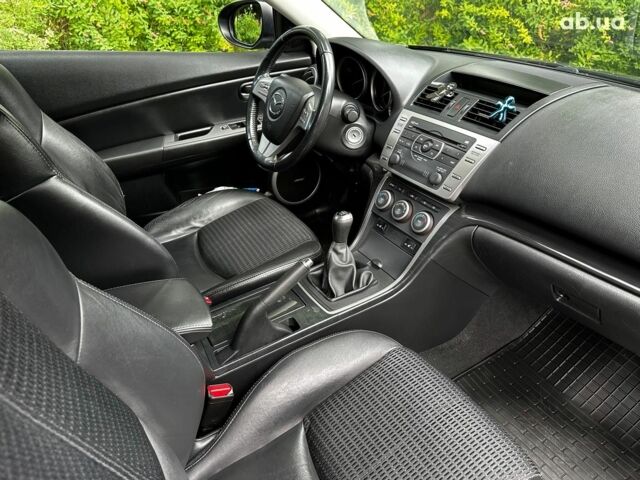 Черный Мазда 6, объемом двигателя 2.2 л и пробегом 214 тыс. км за 7990 $, фото 22 на Automoto.ua