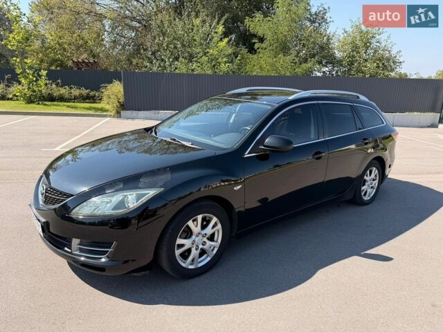 Черный Мазда 6, объемом двигателя 1.8 л и пробегом 250 тыс. км за 4999 $, фото 1 на Automoto.ua