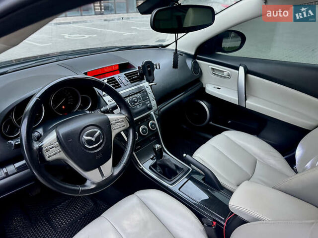 Черный Мазда 6, объемом двигателя 2 л и пробегом 235 тыс. км за 9200 $, фото 5 на Automoto.ua