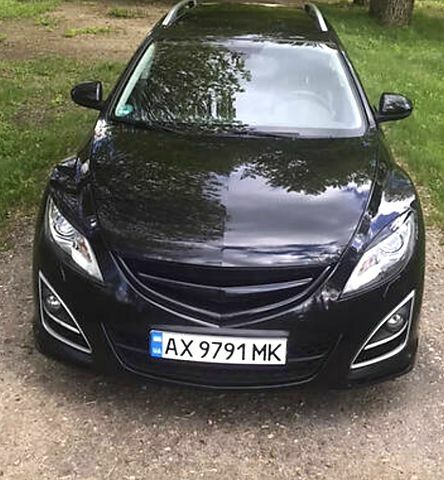 Черный Мазда 6, объемом двигателя 2.2 л и пробегом 260 тыс. км за 9500 $, фото 5 на Automoto.ua