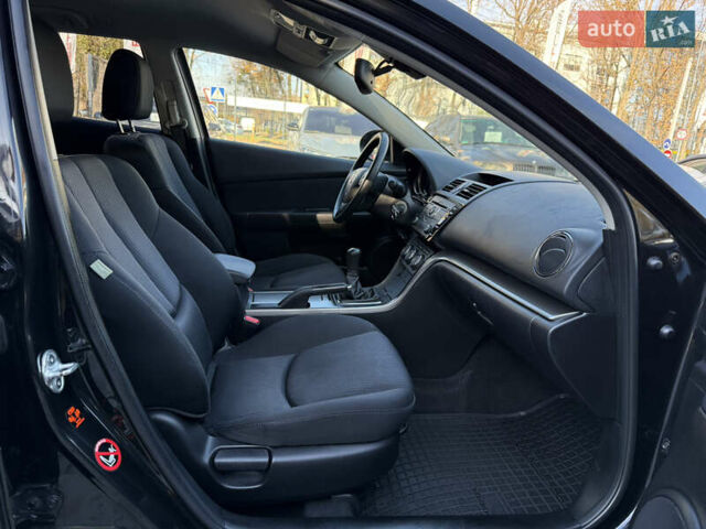 Чорний Мазда 6, об'ємом двигуна 2.18 л та пробігом 210 тис. км за 7500 $, фото 32 на Automoto.ua
