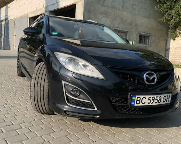 Черный Мазда 6, объемом двигателя 2.18 л и пробегом 280 тыс. км за 8000 $, фото 6 на Automoto.ua