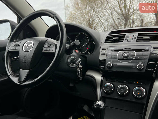 Чорний Мазда 6, об'ємом двигуна 1.8 л та пробігом 190 тис. км за 7800 $, фото 14 на Automoto.ua