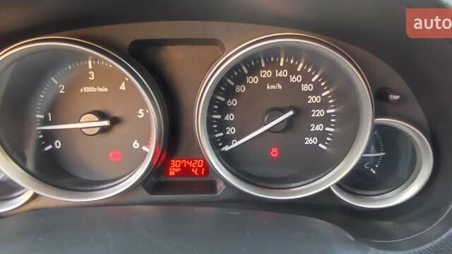 Черный Мазда 6, объемом двигателя 2.18 л и пробегом 307 тыс. км за 7350 $, фото 3 на Automoto.ua