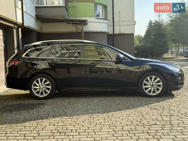 Чорний Мазда 6, об'ємом двигуна 2.2 л та пробігом 296 тис. км за 7500 $, фото 4 на Automoto.ua