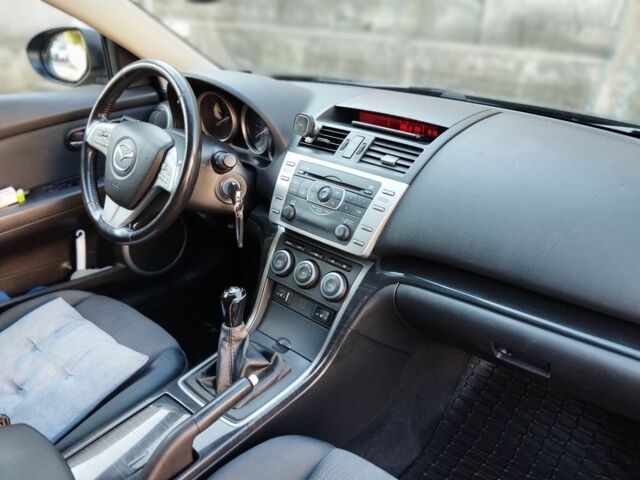 Черный Мазда 6, объемом двигателя 2 л и пробегом 270 тыс. км за 6800 $, фото 6 на Automoto.ua