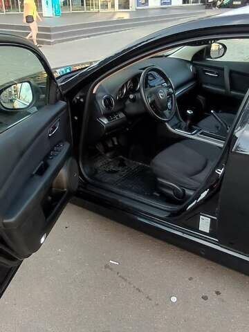 Черный Мазда 6, объемом двигателя 2.18 л и пробегом 307 тыс. км за 7350 $, фото 6 на Automoto.ua