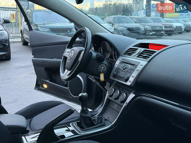 Черный Мазда 6, объемом двигателя 2 л и пробегом 220 тыс. км за 8600 $, фото 21 на Automoto.ua