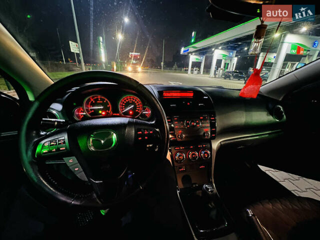 Черный Мазда 6, объемом двигателя 2.18 л и пробегом 237 тыс. км за 6700 $, фото 10 на Automoto.ua