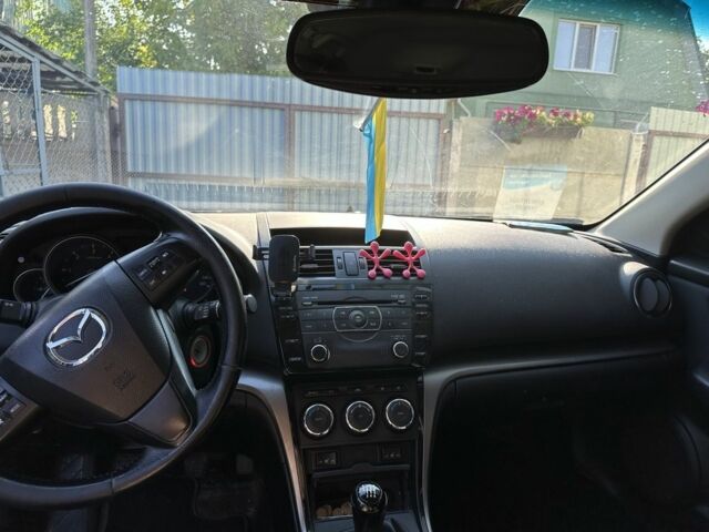 Черный Мазда 6, объемом двигателя 2.2 л и пробегом 304 тыс. км за 7500 $, фото 9 на Automoto.ua