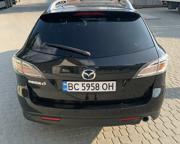Черный Мазда 6, объемом двигателя 2.18 л и пробегом 280 тыс. км за 8000 $, фото 3 на Automoto.ua