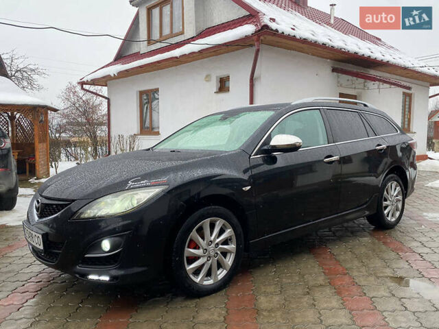 Черный Мазда 6, объемом двигателя 2.2 л и пробегом 325 тыс. км за 5650 $, фото 1 на Automoto.ua