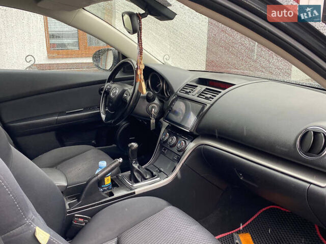 Черный Мазда 6, объемом двигателя 2.2 л и пробегом 325 тыс. км за 5650 $, фото 18 на Automoto.ua