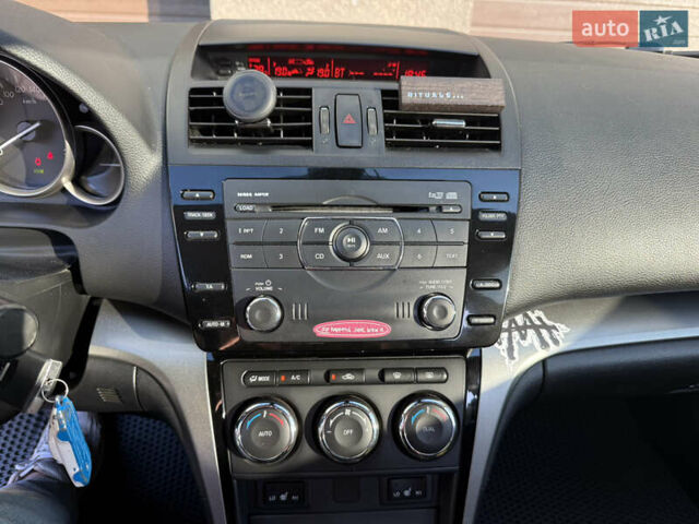 Чорний Мазда 6, об'ємом двигуна 2.2 л та пробігом 296 тис. км за 7500 $, фото 10 на Automoto.ua