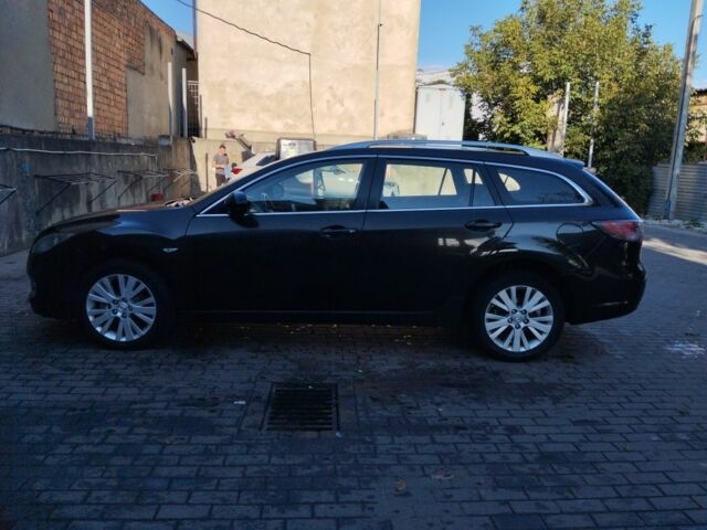 Черный Мазда 6, объемом двигателя 2 л и пробегом 270 тыс. км за 6800 $, фото 1 на Automoto.ua