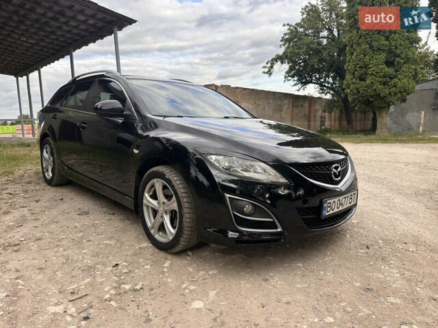 Черный Мазда 6, объемом двигателя 2.18 л и пробегом 321 тыс. км за 6400 $, фото 7 на Automoto.ua