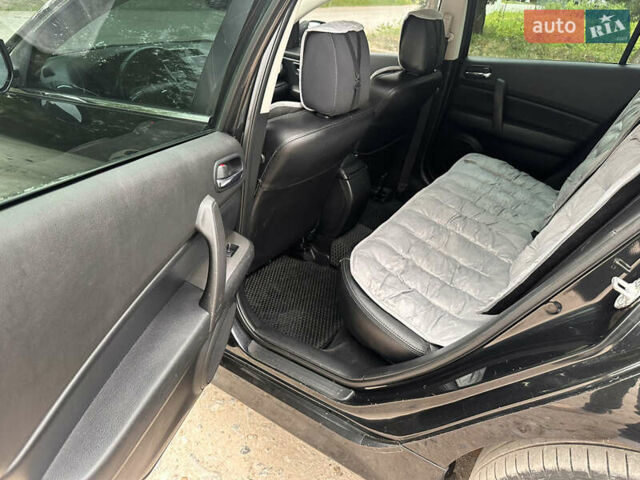 Черный Мазда 6, объемом двигателя 2.18 л и пробегом 321 тыс. км за 6400 $, фото 18 на Automoto.ua