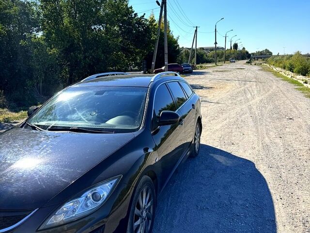 Чорний Мазда 6, об'ємом двигуна 2.2 л та пробігом 232 тис. км за 5700 $, фото 1 на Automoto.ua