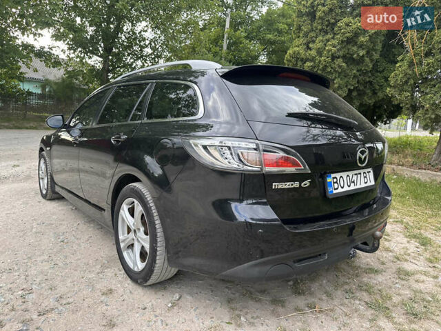 Черный Мазда 6, объемом двигателя 2.18 л и пробегом 321 тыс. км за 6400 $, фото 1 на Automoto.ua