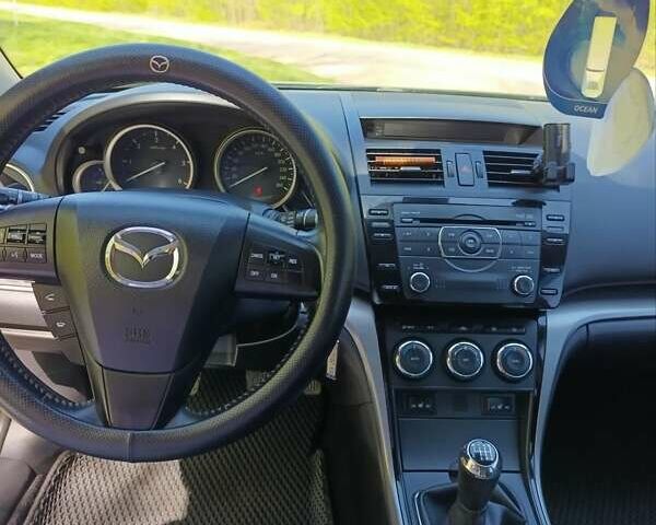 Черный Мазда 6, объемом двигателя 2.18 л и пробегом 282 тыс. км за 7600 $, фото 8 на Automoto.ua