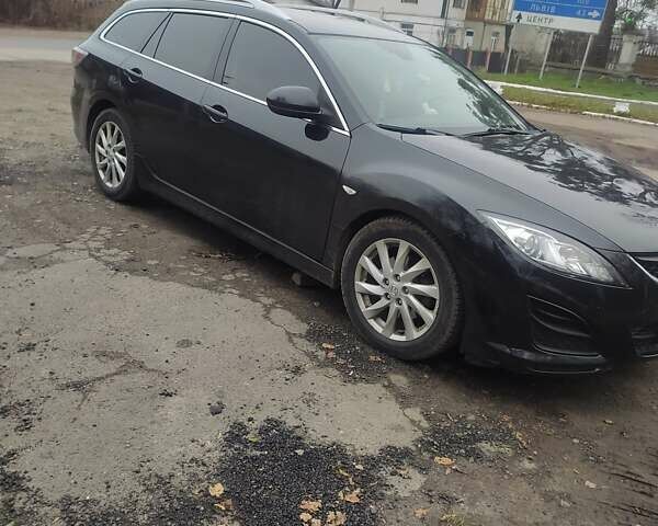 Черный Мазда 6, объемом двигателя 2.2 л и пробегом 305 тыс. км за 7200 $, фото 7 на Automoto.ua