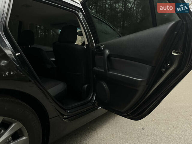 Черный Мазда 6, объемом двигателя 2.18 л и пробегом 234 тыс. км за 6850 $, фото 10 на Automoto.ua