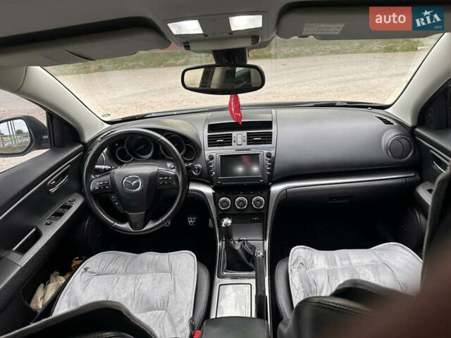 Черный Мазда 6, объемом двигателя 2.18 л и пробегом 321 тыс. км за 6400 $, фото 23 на Automoto.ua