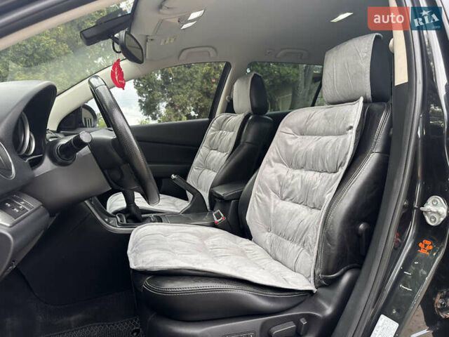 Черный Мазда 6, объемом двигателя 2.18 л и пробегом 321 тыс. км за 6400 $, фото 15 на Automoto.ua