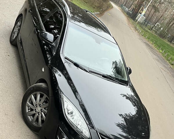 Черный Мазда 6, объемом двигателя 2.18 л и пробегом 234 тыс. км за 6850 $, фото 9 на Automoto.ua